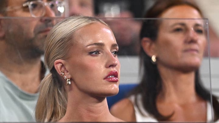 Morgan Riddle shows off her sheer black outfit at the Australian Open.