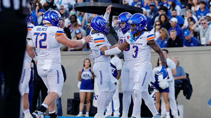 Sep 20, 2025; Colorado Springs, Colorado, USA; Boise State Broncos tight end Matt Lauter (85) celebrates his touchdown with quarterback Maddux Madsen (4) and wide receiver Latrell Caples (3) in the second quarter against the Air Force Falcons at Falcon Stadium. Mandatory Credit: Isaiah J. Downing-Imagn Images