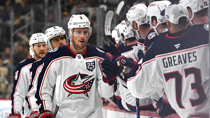 Blue Jackets center Charlie Coyle celebrates a goal with his bench.  Blue Jackets center Charlie Coyle celebrates a goal with his bench.