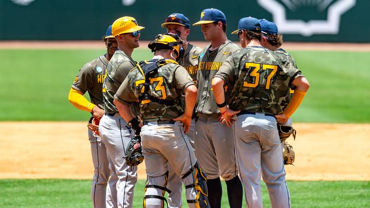 West Virginia Head Coach Steve Sabins visits the mound as The LSU Tigers take on the West Virginia Mountaineers in game 1 of the 2025 NCAA Div 1 Super Regional Baseball Championship at Alex Box Stadium in Baton Rouge, LA. Saturday, June 7, 2025.