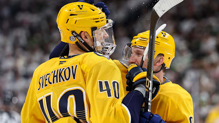 Nov 30, 2024; Saint Paul, Minnesota, USA; Nashville Predators center Fedor Svechkov (40) celebrates his goal with center Steven Stamkos (91) during the first period against the Minnesota Wild  at Xcel Energy Center. Mandatory Credit: Matt Krohn-Imagn Images