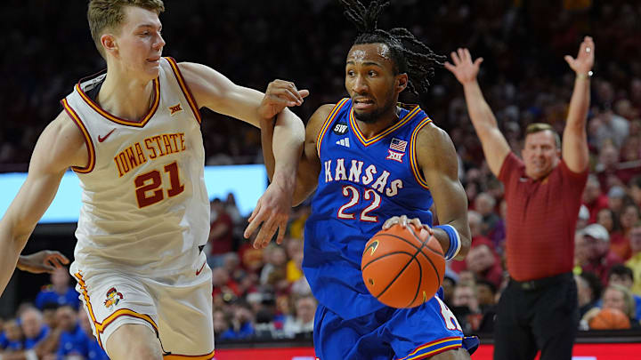 Kansas Jayhawks guard Darryn Peterson (22) drives with the ball as Iowa State Cyclones forward Dominykas Pleta (21) during the second half in the Big-12 conference basketball showdown on Feb. 14, 2026, at Hilton Coliseum, in Ames, Iowa. Kansas Jayhawks guard Darryn Peterson (22) drives with the ball as Iowa State Cyclones forward Dominykas Pleta (21) during the second half in the Big-12 conference basketball showdown on Feb. 14, 2026, at Hilton Coliseum, in Ames, Iowa.