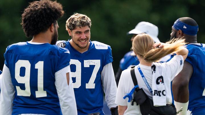 Indianapolis Colts defensive end Laiatu Latu (97) laughs with defensive linemen Friday, July 25, 2025, ahead of training camp held at Grand Park in Westfield.