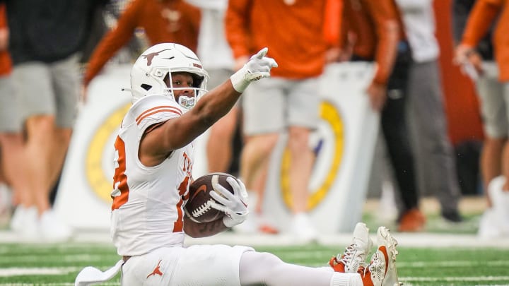 Texas White team wider receiver Ryan Niblett (18) celebrates making a catch for a first down in the second quarter of the Longhorns' spring Orange and White game at Darrell K Royal Texas Memorial Stadium in Austin, Texas, April 20, 2024. Texas White team wider receiver Ryan Niblett (18) celebrates making a catch for a first down in the second quarter of the Longhorns' spring Orange and White game at Darrell K Royal Texas Memorial Stadium in Austin, Texas, April 20, 2024.