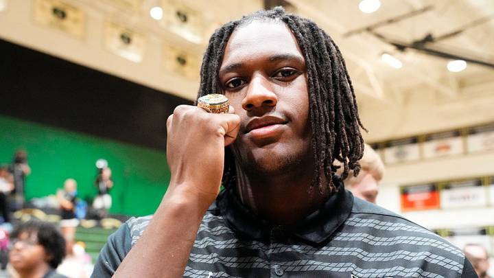 Basha High defensive lineman Landen Wade poses with his ring during the ring ceremony honoring players and coaches who were part of the 2025 Open Division state championship team on April 29, 2026, at Basha High in Chandler. Basha High defensive lineman Landen Wade poses with his ring during the ring ceremony honoring players and coaches who were part of the 2025 Open Division state championship team on April 29, 2026, at Basha High in Chandler.