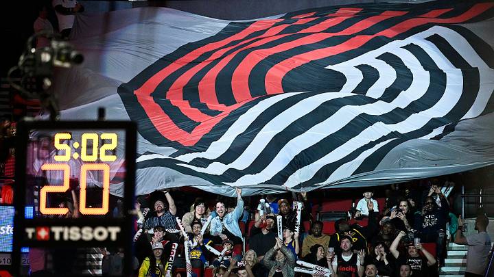 Apr 11, 2024: Portland, Oregon, USA; Portland Trail Blazers basketball fans celebrate during the second half against the Golden State Warriors at Moda Center. Mandatory Credit: Troy Wayrynen Apr 11, 2024: Portland, Oregon, USA; Portland Trail Blazers basketball fans celebrate during the second half against the Golden State Warriors at Moda Center. Mandatory Credit: Troy Wayrynen