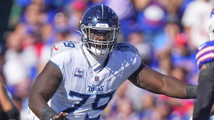 Oct 20, 2024; Orchard Park, New York, USA; Tennessee Titans center Lloyd Cushenberry III (79) looks to block against the Buffalo Bills during the first half at Highmark Stadium. Mandatory Credit: Gregory Fisher-Imagn Images