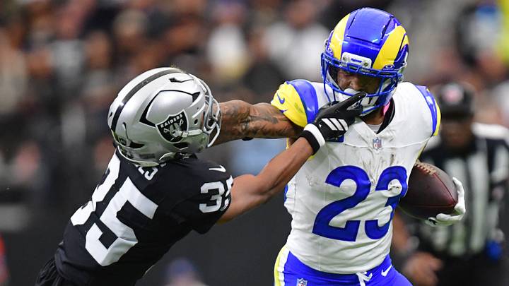 Los Angeles Rams running back Kyren Williams (23) rushes the ball past Las Vegas Raiders cornerback Hezekiah Masses (35) at Allegiant Stadium. Los Angeles Rams running back Kyren Williams (23) rushes the ball past Las Vegas Raiders cornerback Hezekiah Masses (35) at Allegiant Stadium.
