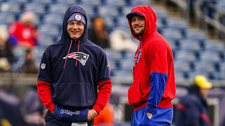 Jan 5, 2025; Foxborough, Massachusetts, USA; Buffalo Bills quarterback Josh Allen (17) and New England Patriots quarterback Drake Maye (10) talk on the field