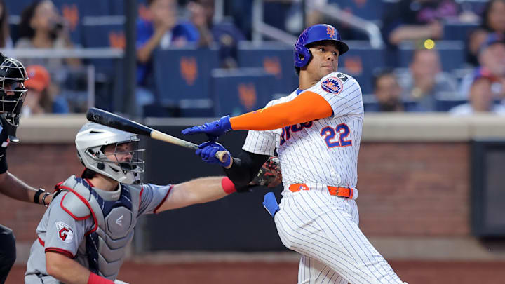 Aug 4, 2025; New York City, New York, USA; New York Mets right fielder Juan Soto (22) follows through on a single against the Cleveland Guardians during the fourth inning at Citi Field. Aug 4, 2025; New York City, New York, USA; New York Mets right fielder Juan Soto (22) follows through on a single against the Cleveland Guardians during the fourth inning at Citi Field.