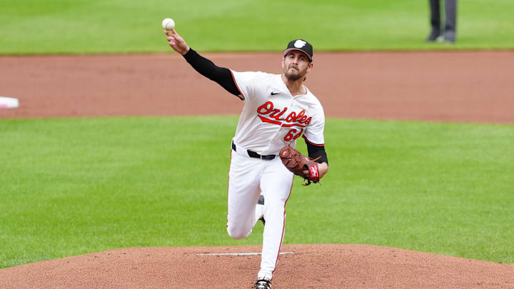 May 12, 2024; Baltimore, Maryland, USA; Baltimore Orioles pitcher Dean Kremer (64) delivers a pitch against the Arizona Diamondbacks during the first inning at Oriole Park at Camden Yards.