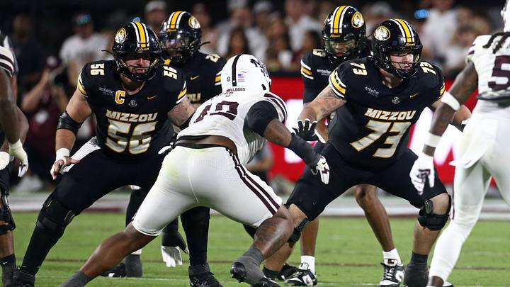 Sep 26, 2026; Starkville, Mississippi, USA; Missouri Tigers offensive linemen Dominick Giudice (56) and Tristan Wilson (73) block during the third quarter against the Mississippi State Bulldogs at Davis Wade Stadium at Scott Field. Mandatory Credit: Petre Thomas-Imagn Images