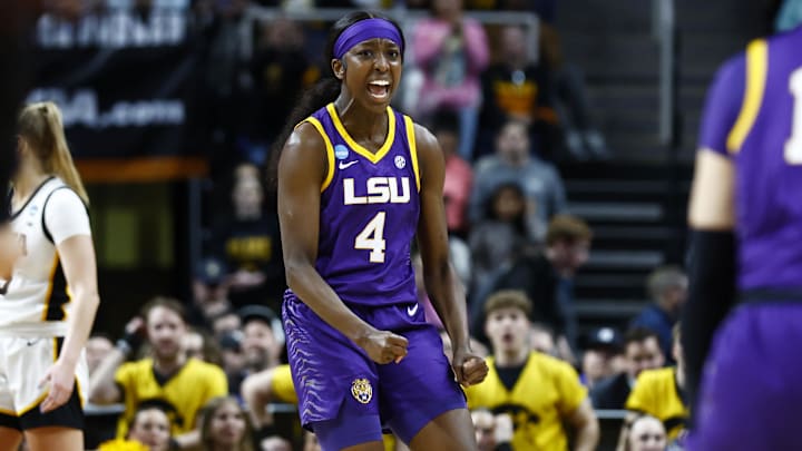 Apr 1, 2024; Albany, NY, USA; LSU Lady Tigers guard Flau'jae Johnson (4) reacts in the second quarter against the Iowa Hawkeyes in the finals of the Albany Regional in the 2024 NCAA Tournament at MVP Arena. Mandatory Credit: Winslow Townson-Imagn Images Apr 1, 2024; Albany, NY, USA; LSU Lady Tigers guard Flau'jae Johnson (4) reacts in the second quarter against the Iowa Hawkeyes in the finals of the Albany Regional in the 2024 NCAA Tournament at MVP Arena. Mandatory Credit: Winslow Townson-Imagn Images
