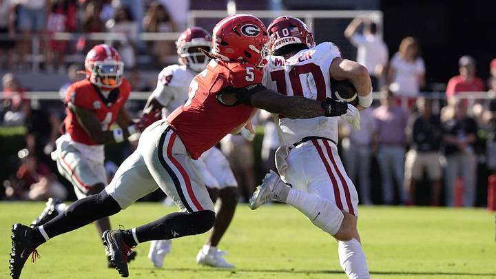 Sep 26, 2026; Athens, Georgia, USA;  Georgia Bulldogs linebacker Raylen Wilson (5) sacks Oklahoma Sooners quarterback John Mateer (10) during the first half at Sanford Stadium.  Mandatory Credit: Dale Zanine-Imagn Images