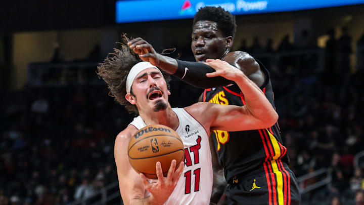 Dec 26, 2025; Atlanta, Georgia, USA; Atlanta Hawks forward Mouhamed Gueye (18) makes a foul against Miami Heat forward Jaime Jaquez Jr. (11) during the second quarter at State Farm Arena. Mandatory Credit: Jordan Godfree-Imagn Images Dec 26, 2025; Atlanta, Georgia, USA; Atlanta Hawks forward Mouhamed Gueye (18) makes a foul against Miami Heat forward Jaime Jaquez Jr. (11) during the second quarter at State Farm Arena. Mandatory Credit: Jordan Godfree-Imagn Images
