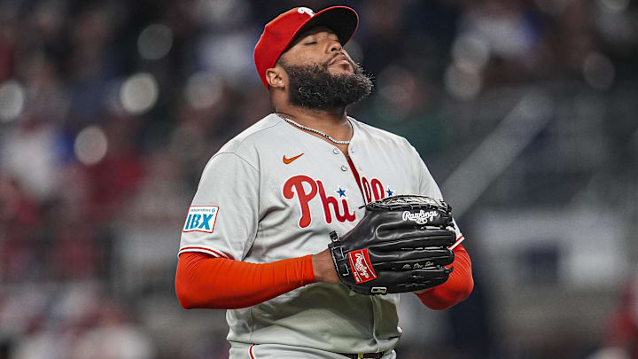 Apr 9, 2025; Cumberland, Georgia, USA; Philadelphia Phillies pitcher Jose Alvarado (46) reacts after retiring the side against the Atlanta Braves during the eighth inning at Truist Park