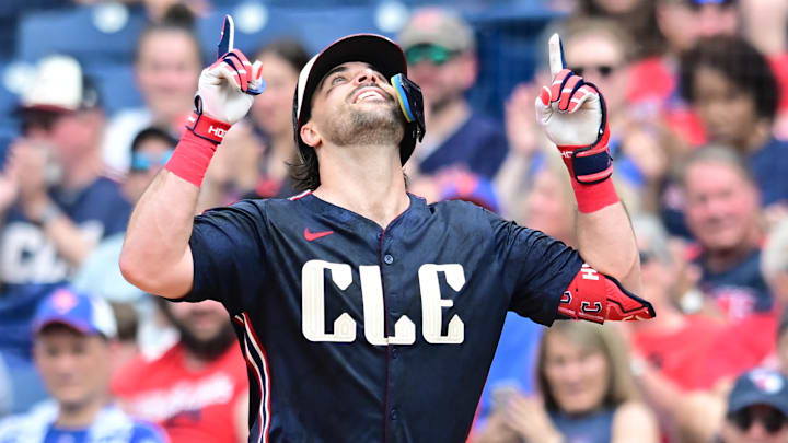 May 22, 2024; Cleveland, Ohio, USA; Cleveland Guardians catcher Austin Hedges (27) celebrates after hitting a bunt single during the sixth inning against the New York Mets at Progressive Field. Mandatory Credit: Ken Blaze-USA TODAY Sports
