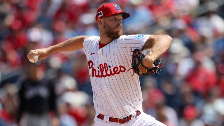 Mar 4, 2025; Clearwater, Florida, USA; Philadelphia Phillies pitcher Zack Wheeler (45) throws a pitch against the New York Yankees in the first inning during spring training at BayCare Ballpark.