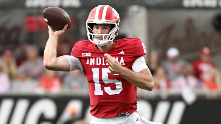 Oct 18, 2025; Bloomington, Indiana, USA; Indiana Hoosiers quarterback Fernando Mendoza (15) throws a pass during the first half against the Michigan State Spartans at Memorial Stadium. Mandatory Credit: Robert Goddin-Imagn Images