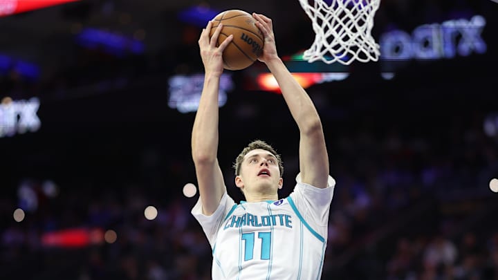 Oct 25, 2025; Philadelphia, Pennsylvania, USA; Charlotte Hornets center Ryan Kalkbrenner (11) drives for a shot against the Philadelphia 76ers during the fourth quarter at Xfinity Mobile Arena. Mandatory Credit: Bill Streicher-Imagn Images