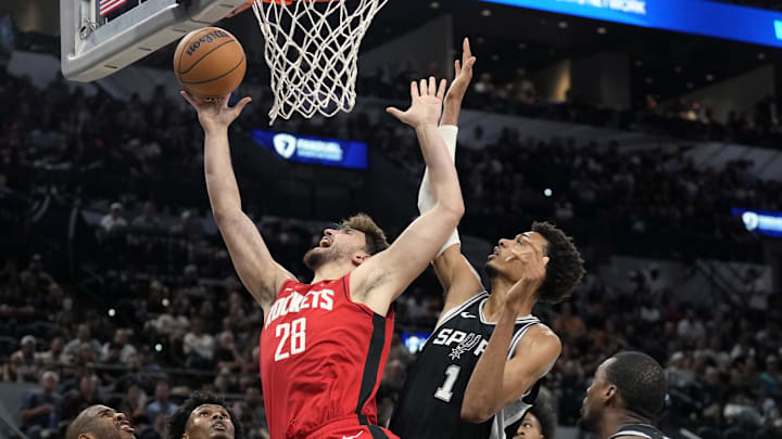 Oct 28, 2024; San Antonio, Texas, USA; Houston Rockets center Alperen Sengun (28) drives to the basket against center Victor Wembanyama (1) during the first half at Frost Bank Center. Mandatory Credit: Scott Wachter-Imagn Images Oct 28, 2024; San Antonio, Texas, USA; Houston Rockets center Alperen Sengun (28) drives to the basket against center Victor Wembanyama (1) during the first half at Frost Bank Center. Mandatory Credit: Scott Wachter-Imagn Images