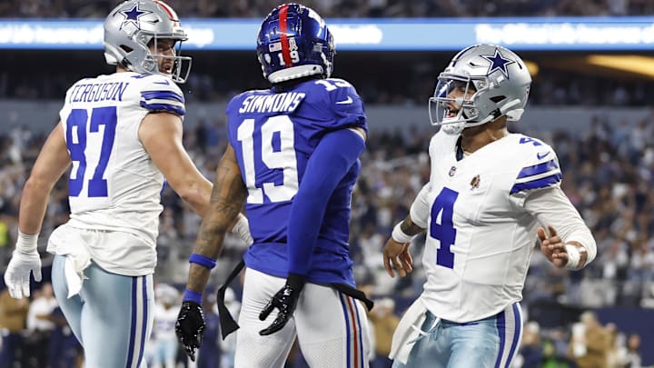Nov 12, 2023; Arlington, Texas, USA; Dallas Cowboys quarterback Dak Prescott (4) reacts after scoring a touchdown in the second quarter against the New York Giants at AT&T Stadium. 