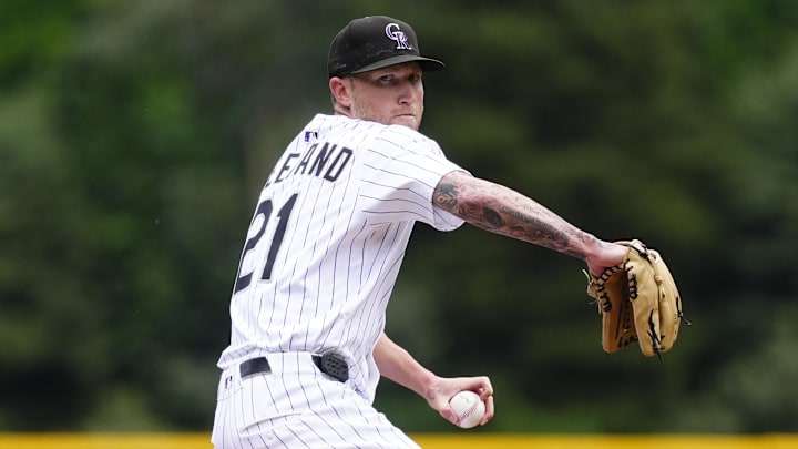 Aug 6, 2025; Denver, Colorado, USA; Colorado Rockies starring pitcher Kyle Freeland (21) delivers a pitch in the first inning against the Toronto Blue Jays at Coors Field. Mandatory Credit: Ron Chenoy-Imagn Images