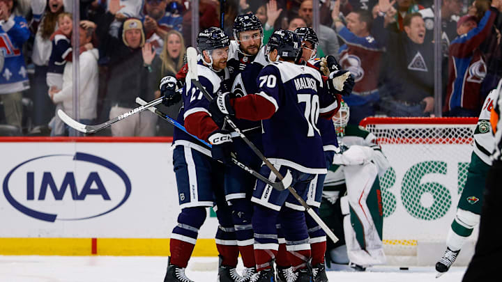 Mar 8, 2026; Denver, Colorado, USA; Colorado Avalanche center Nicolas Roy (10) celebrates his goal with center Brett Kulak (27) and center Jack Drury (18) and defenseman Sam Malinski (70) in the third period against the Minnesota Wild at Ball Arena. Mandatory Credit: Isaiah J. Downing-Imagn Images