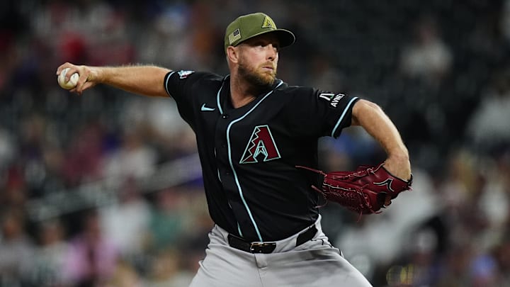 May 15, 2026; Denver, Colorado, USA; Arizona Diamondbacks starting pitcher Merrill Kelly (29) delivers a pitch in the ninth inning against the Colorado Rockies at Coors Field. Mandatory Credit: Ron Chenoy-Imagn Images May 15, 2026; Denver, Colorado, USA; Arizona Diamondbacks starting pitcher Merrill Kelly (29) delivers a pitch in the ninth inning against the Colorado Rockies at Coors Field. Mandatory Credit: Ron Chenoy-Imagn Images