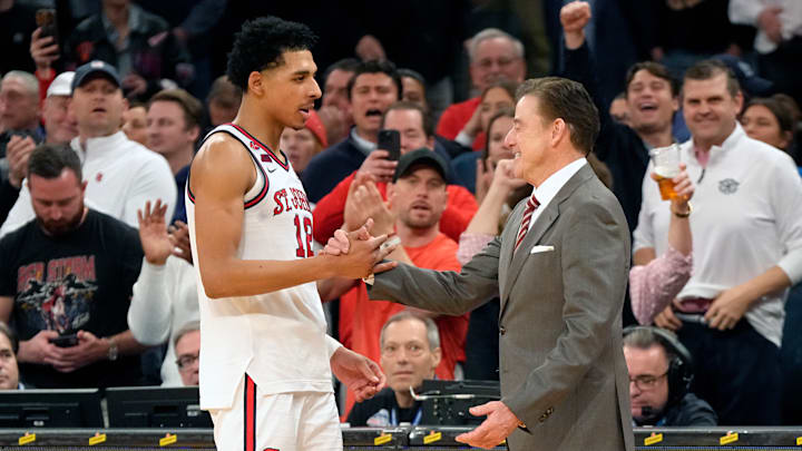 Creighton v St. John's; St. John's basketball head coach Rick Pitino greets RJ Luis after the Big East Championship at Madison Square Garden