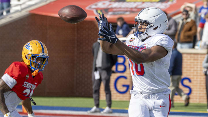 Penn State running back Nick Singleton catches a pass during Senior Bowl practice at Hancock Whitney Stadium. Penn State running back Nick Singleton catches a pass during Senior Bowl practice at Hancock Whitney Stadium.