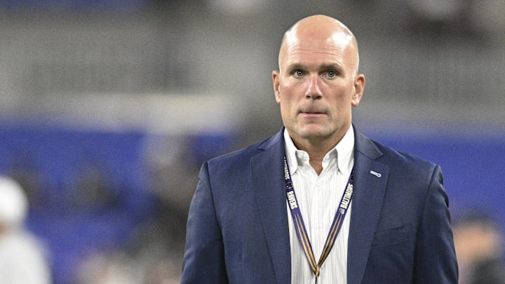 Nov 7, 2024; Baltimore, Maryland, USA;  Baltimore Ravens general manager Eric Decosta one the field before the game against the Cincinnati Bengals at M&T Bank Stadium. Mandatory Credit: Tommy Gilligan-Imagn Images