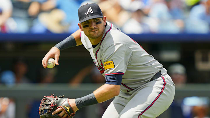 Atlanta Braves third baseman Austin Riley (27) throws to first base during the fifth inning against the Kansas City Royals at Kauffman Stadium. 