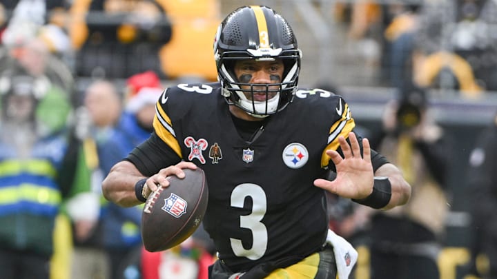 Dec 25, 2024; Pittsburgh, Pennsylvania, USA; Pittsburgh Steelers quarterback Russell Wilson (3) looks to pass against the Kansas City Chiefs during the first half at Acrisure Stadium. Mandatory Credit: Barry Reeger-Imagn Images