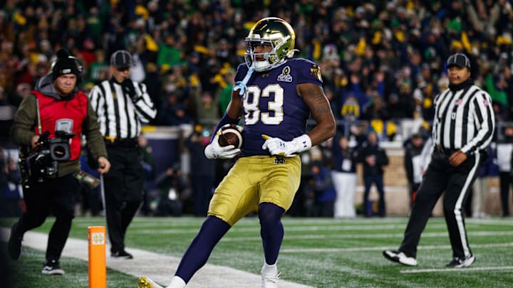 Notre Dame wide receiver Jayden Thomas celebrates after scoring a touchdown during the first round of the College Football Playoff at Notre Dame Stadium.