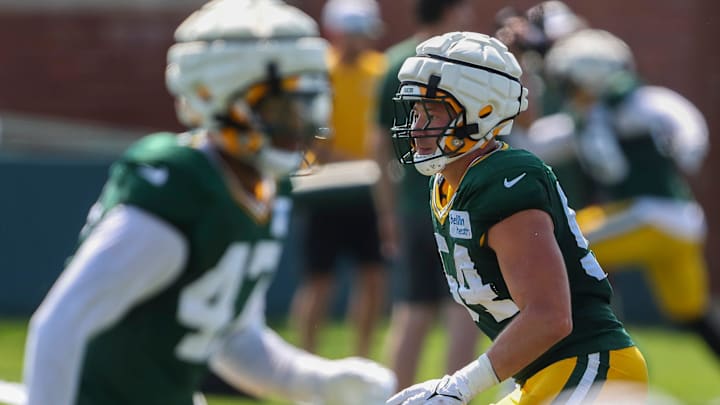 Green Bay Packers linebacker Kristian Welch (54) runs through a drill during training camp.