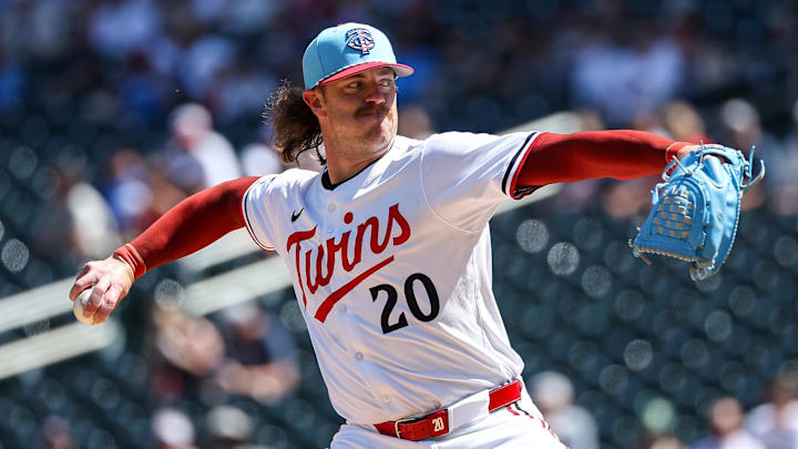 Jul 4, 2025; Minneapolis, Minnesota, USA; Minnesota Twins starting pitcher Chris Paddack (20) delivers a pitch against the Tampa Bay Rays during the first inning at Target Field.