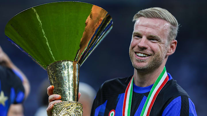Davy Klaassen of FC Internazionale poses with the trophy as...