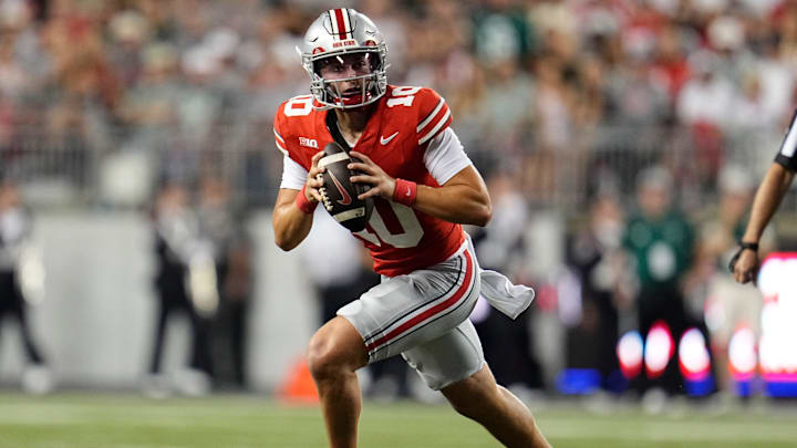 Ohio State Buckeyes quarterback Julian Sayin (10) runs during the first half of the NCAA football game against the Ohio Bobcats at Ohio Stadium on Sept. 13, 2025. Ohio State Buckeyes quarterback Julian Sayin (10) runs during the first half of the NCAA football game against the Ohio Bobcats at Ohio Stadium on Sept. 13, 2025.