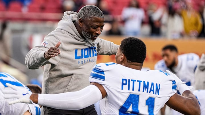 Detroit Lions defensive coordinator Aaron Glenn hugs linebacker Anthony Pittman during warmups before the game against the San Francisco 49ers at Levi's Stadium in Santa Clara, Calif. on Monday, Dec. 30, 2024.