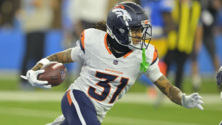 Dec 19, 2024; Inglewood, California, USA;  Denver Broncos cornerback Kris Abrams-Draine (31) runs the ball after an interception in the end zone in the first half against the Los Angeles Chargers at SoFi Stadium. Mandatory Credit: Jayne Kamin-Oncea-Imagn Images