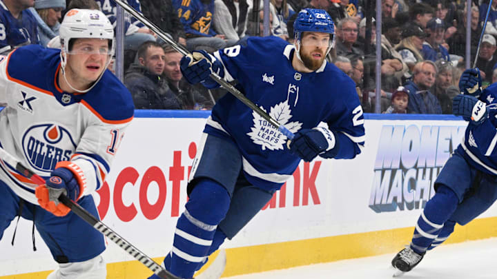 Nov 16, 2024; Toronto, Ontario, CAN;  Toronto Maple Leafs defenseman Jani Hakanpaa (28) pursues the play against the Edmonton Oilers in the second period at Scotiabank Arena. Mandatory Credit: Dan Hamilton-Imagn Images