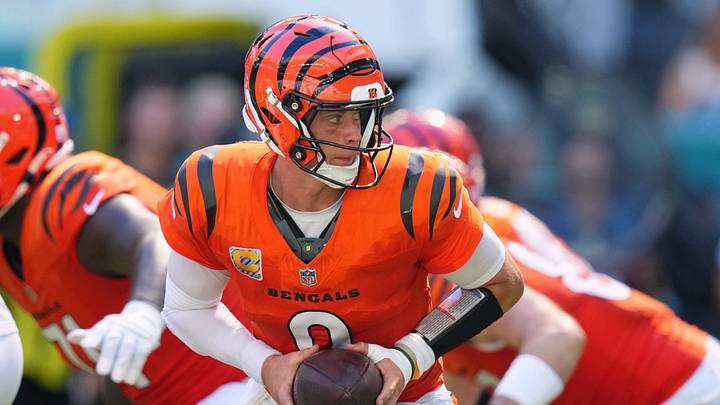 Oct 11, 2026; Miami Gardens, Florida, USA; Cincinnati Bengals quarterback Joe Burrow (9) hands the ball during the third quarter against the Miami Dolphins at Hard Rock Stadium. Mandatory Credit: Rich Storry-Imagn Images Oct 11, 2026; Miami Gardens, Florida, USA; Cincinnati Bengals quarterback Joe Burrow (9) hands the ball during the third quarter against the Miami Dolphins at Hard Rock Stadium. Mandatory Credit: Rich Storry-Imagn Images