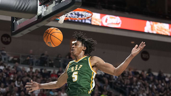 March 10, 2025; Las Vegas, NV, USA; San Francisco Dons guard Tyrone Riley IV (5) dunks the basketball against the Gonzaga Bulldogs during the second half in the semifinal of the West Coast Conference tournament at Orleans Arena. Mandatory Credit: Kyle Terada-Imagn Images