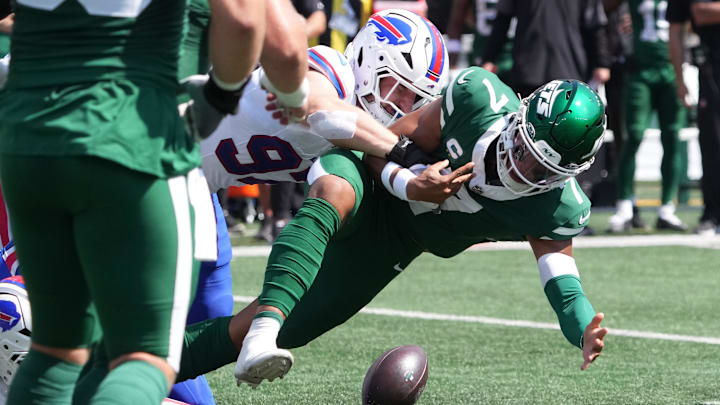 Sep 14, 2025; East Rutherford, New Jersey, USA; Buffalo Bills defensive end Joey Bosa (97) causes a fumble on New York Jets quarterback Justin Fields (7)