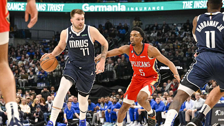 Feb 2, 2023; Dallas, Texas, USA; Dallas Mavericks guard Luka Doncic (77) and New Orleans Pelicans forward Herbert Jones (5) in action during the game between the Dallas Mavericks and the New Orleans Pelicans at American Airlines Center. Feb 2, 2023; Dallas, Texas, USA; Dallas Mavericks guard Luka Doncic (77) and New Orleans Pelicans forward Herbert Jones (5) in action during the game between the Dallas Mavericks and the New Orleans Pelicans at American Airlines Center.