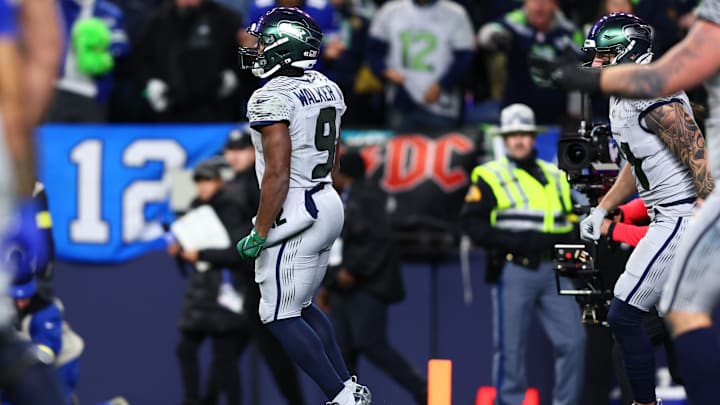 Dec 18, 2025; Seattle, Washington, USA; Seattle Seahawks running back Kenneth Walker III (9) celebrates after scoring a touchdown against the Los Angeles Rams  in the second half at Lumen Field. Mandatory Credit: Kevin Ng-Imagn Images