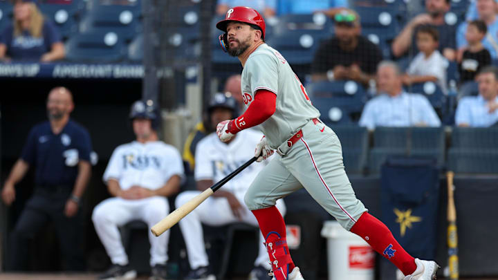 May 6, 2025; Tampa, Florida, USA; Philadelphia Phillies designated hitter Kyle Schwarber (12) hits a solo home run against the Tampa Bay Rays in the first inning at George M. Steinbrenner Field.