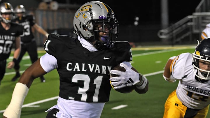 Calvary's James Simon moves the ball against D'Arbonne Woods Friday 10-20-23.