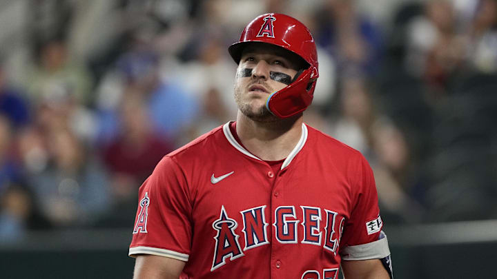 Apr 17, 2025; Arlington, Texas, USA; Los Angeles Angels right fielder Mike Trout (27) looks on after striking out against the Texas Rangers during the first inning at Globe Life Field. Mandatory Credit: Jim Cowsert-Imagn Images